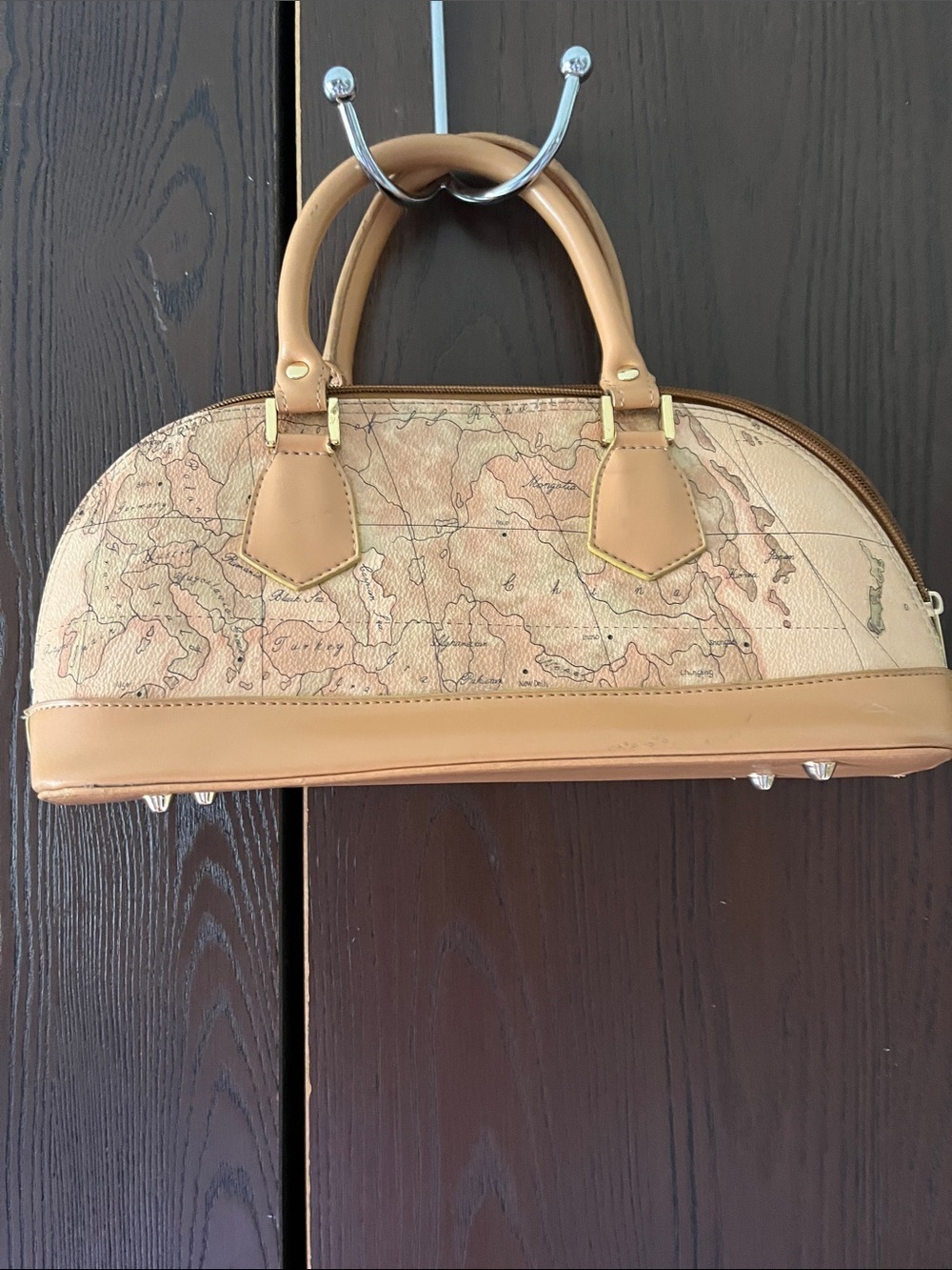 Unbranded small world design purse.